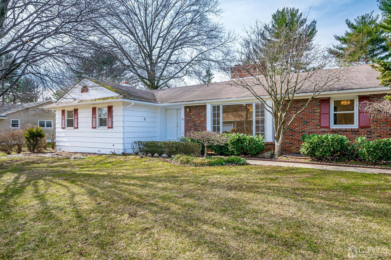 5 Robin Road Edison, NJ 08820 - Photo 2 of 43 a front view of a house with a yard