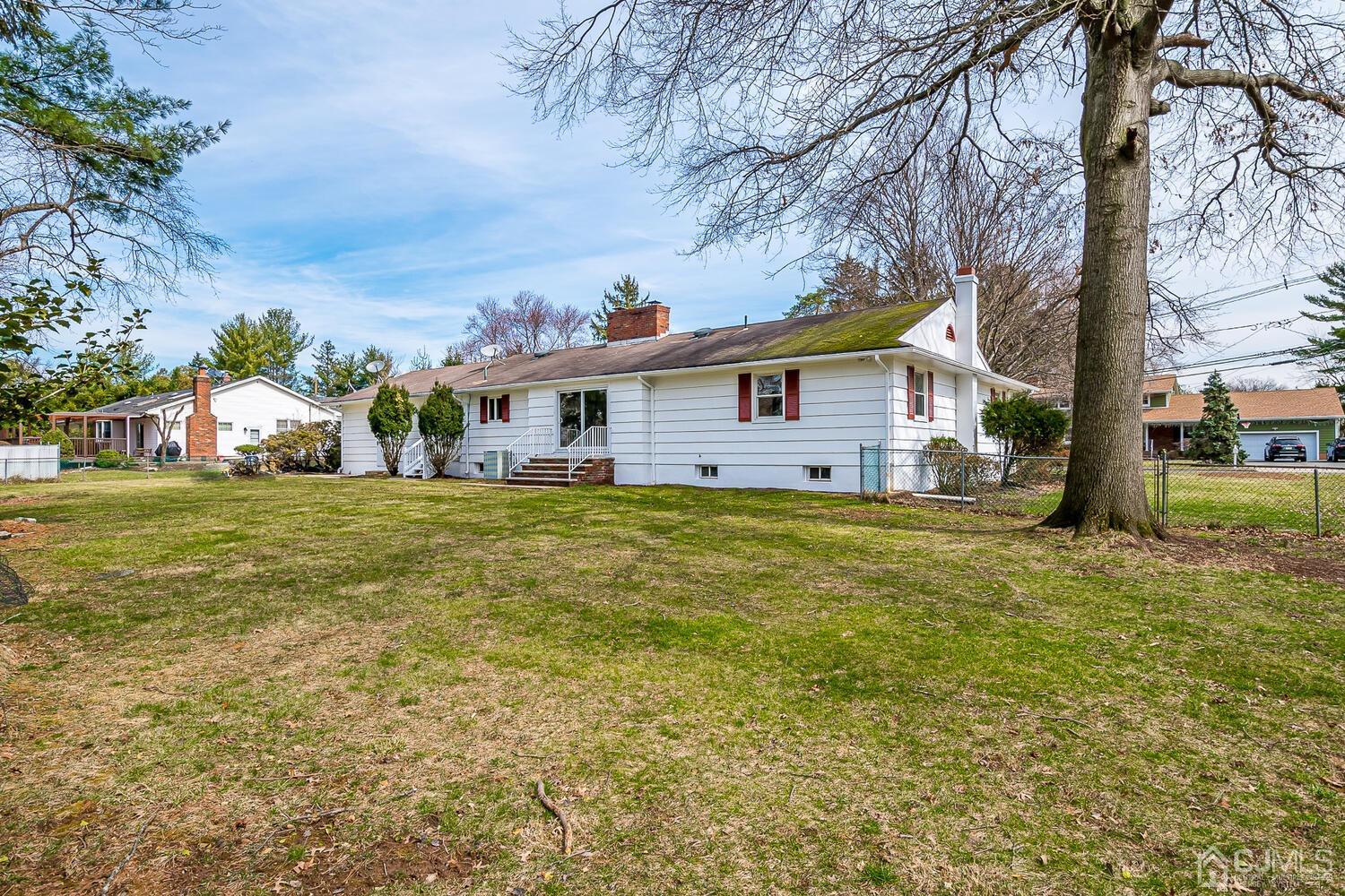 5 Robin Road Edison, NJ 08820 - Photo 33 of 43 a view of house that has garden