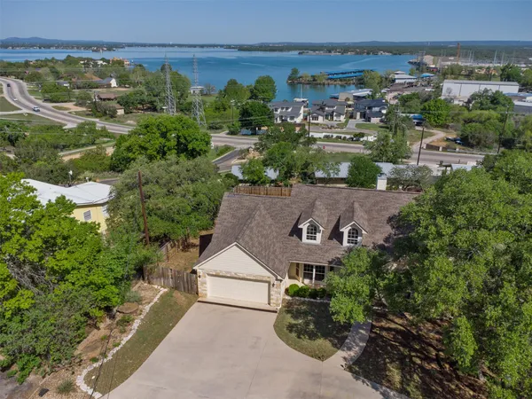 an aerial view of a house with a garden