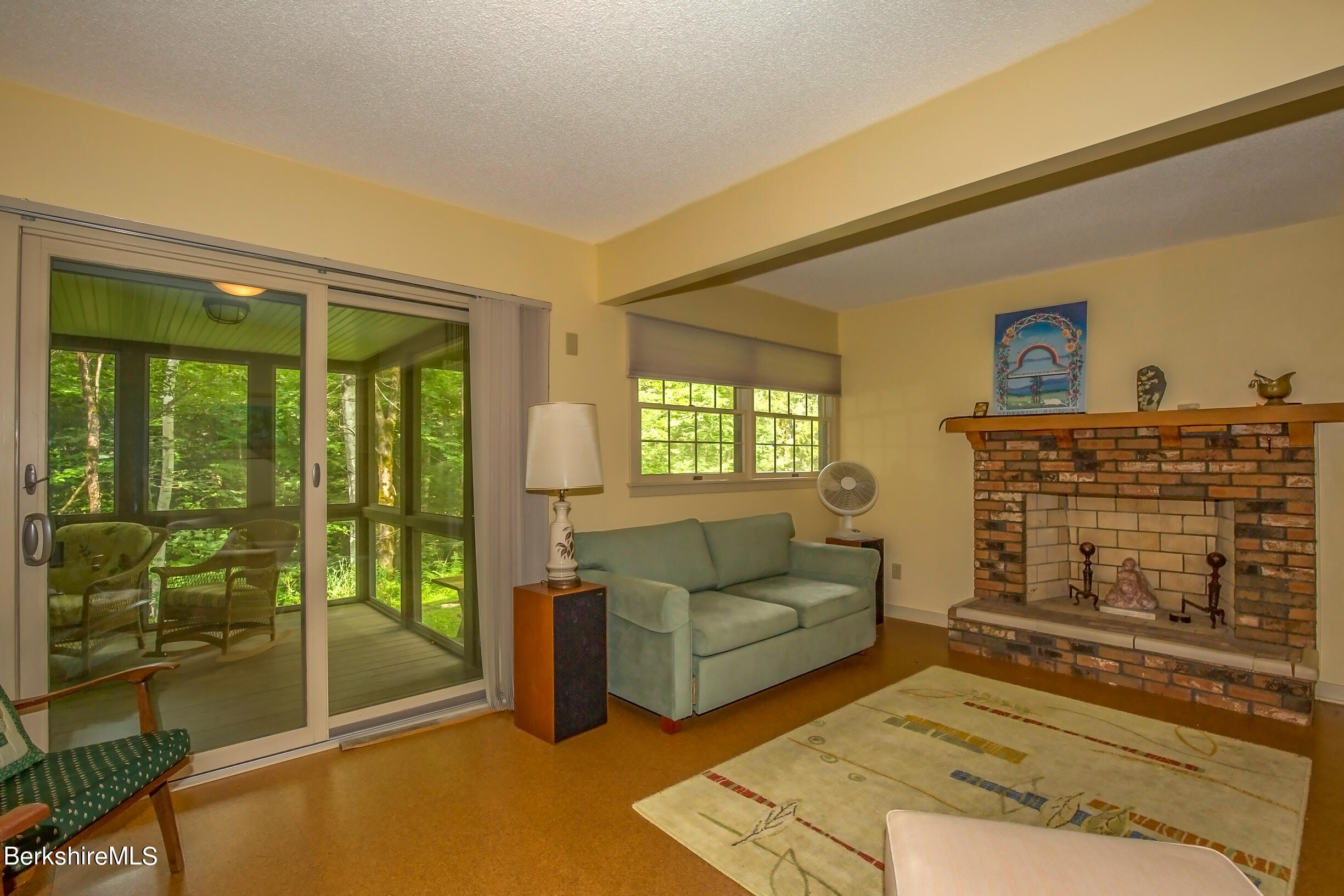 494 Woodmere Road Becket, MA 01223 - Photo 26 of 42 LowerLivingRoomtoporch