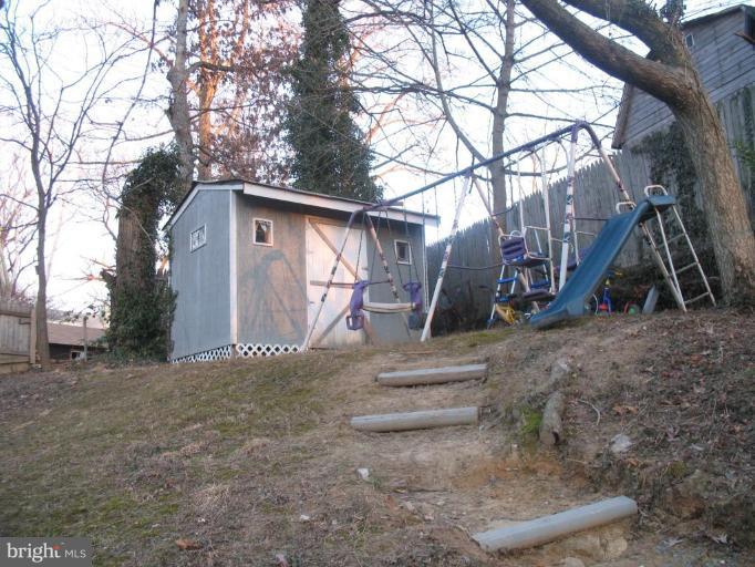 12409 Denley Road Silver Spring, MD 20906 - Photo 2 of 15 a view of a house with a back yard