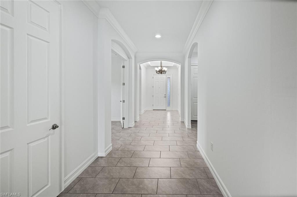 1488 Mockingbird Drive Naples, FL 34120 - Photo 24 of 38 a view of a hallway