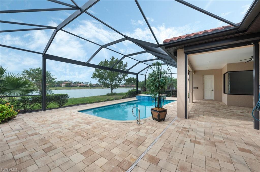 1488 Mockingbird Drive Naples, FL 34120 - Photo 30 of 38 a view of swimming pool with a patio