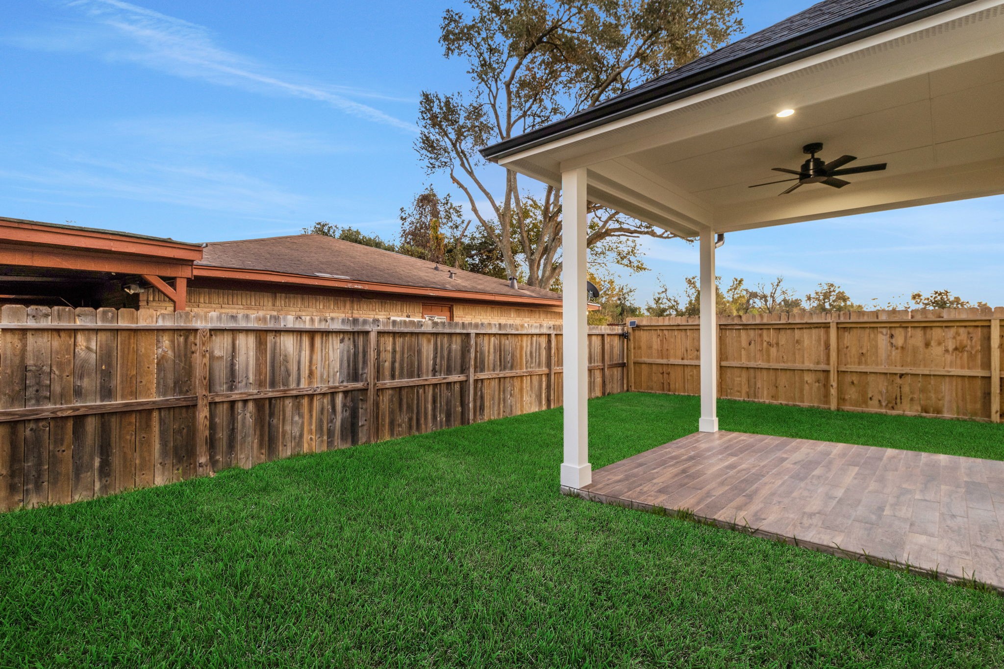 4202 Plaag Street Houston, TX 77016 - Photo 3 of 38 Covered patio with French doors, ideal for outdoor entertaining and relaxing evenings.