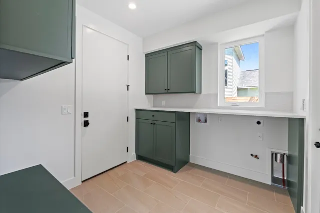 a room view with wooden floor and window