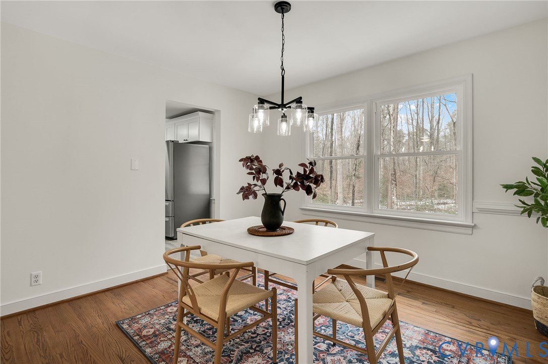 16430 St Peters Church Road Montpelier, VA 23192 - Photo 15 of 30 a view of a dining room with furniture window and wooden floor
