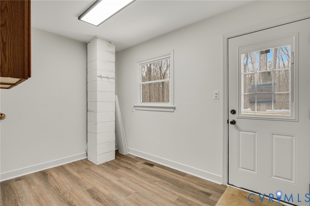 16430 St Peters Church Road Montpelier, VA 23192 - Photo 19 of 30 wooden floor in an empty room