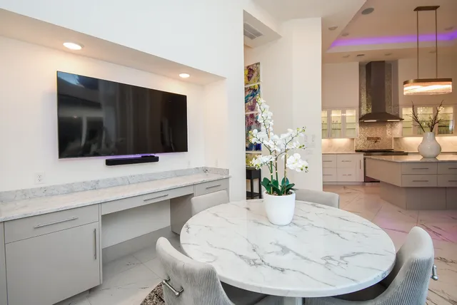 a view of a dining room with furniture window and outside view