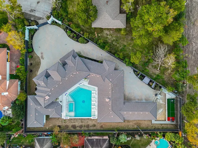 front view of a brick house with a large windows