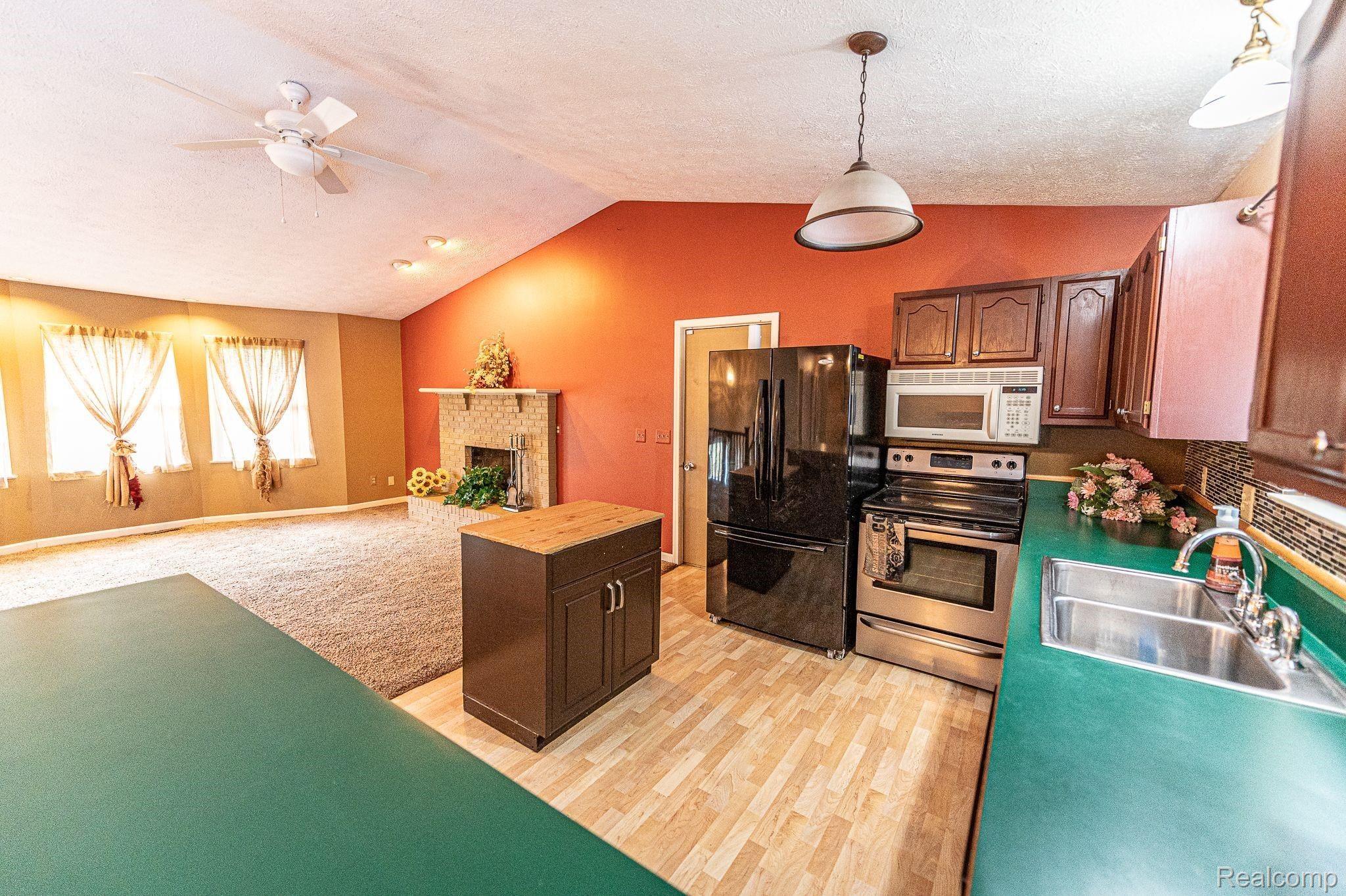 7881 Oak Grove Road Howell, MI 48855 - Photo 22 of 31 Dining room to kitchen.jpeg