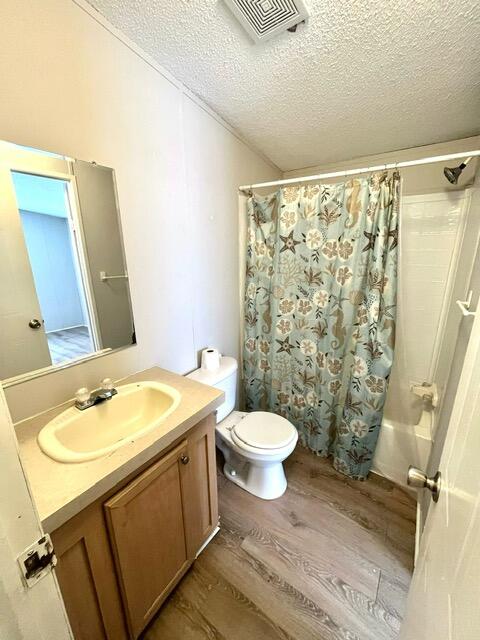5000 Southeast Federal Highway, Unit 806 Stuart, FL 34997 - Photo 16 of 22 a bathroom with a sink toilet and shower
