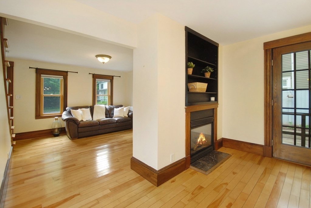 1832 Main Street Concord, MA 01742 - Photo 15 of 25 a living room with furniture and a flat screen tv