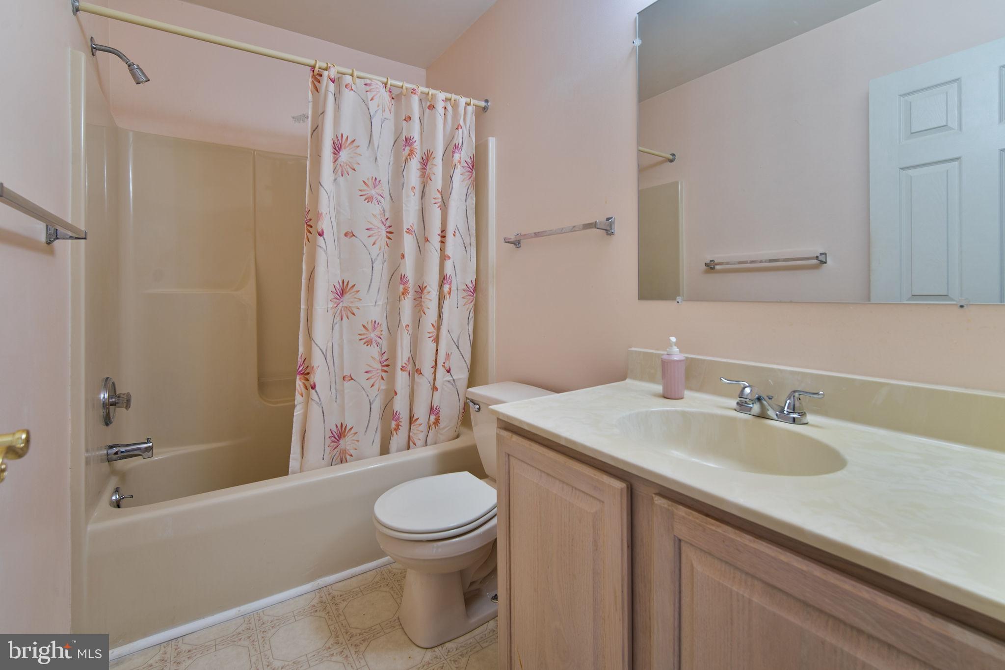 29 Bastille Loop Newark, DE 19702 - Photo 22 of 34 a bathroom with a sink a toilet and shower