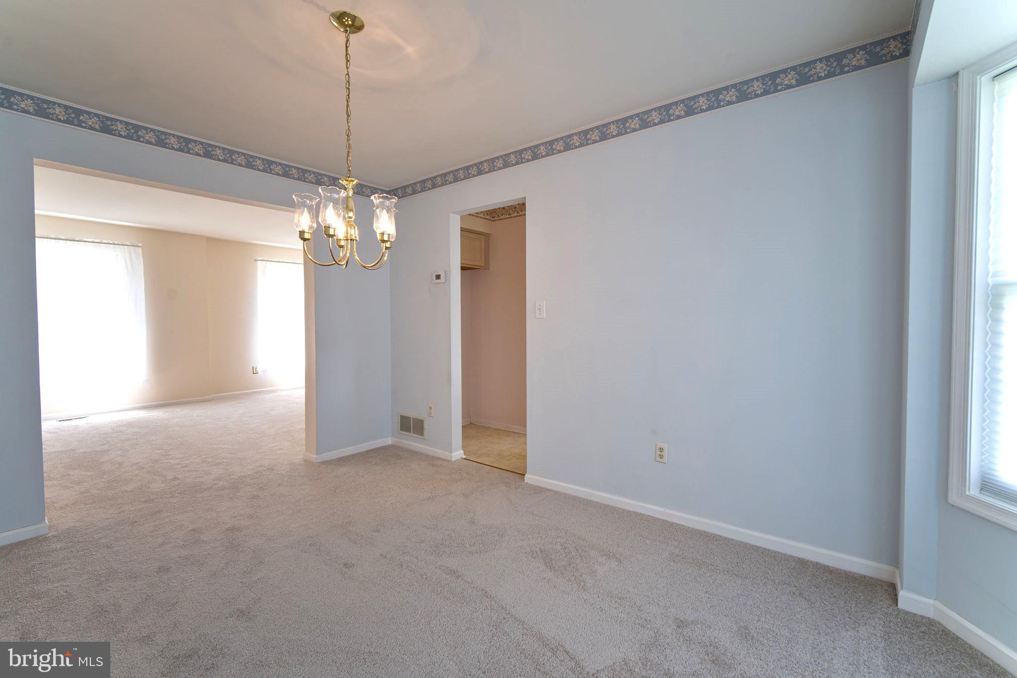 29 Bastille Loop Newark, DE 19702 - Photo 7 of 34 a view of a chandelier in big room and chandelier fan