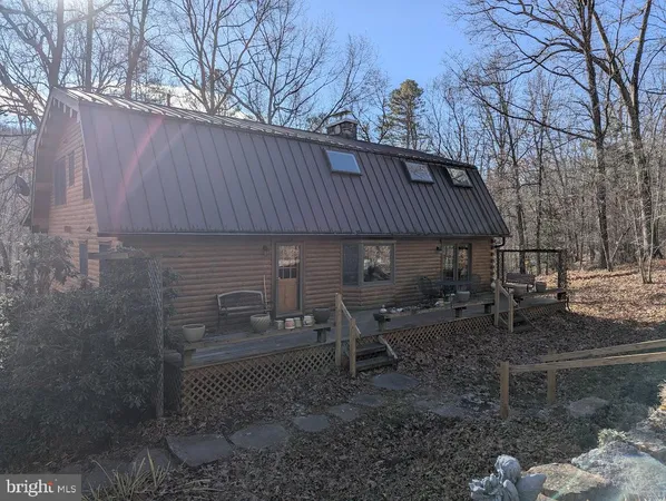 a view of balcony with wooden floor