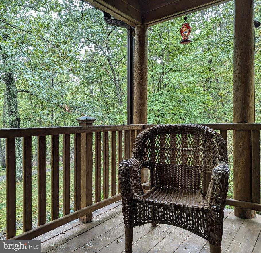 1537 Hidden Valley Road Franklin, WV 26807 - Photo 20 of 78 a view of a two chairs in the deck