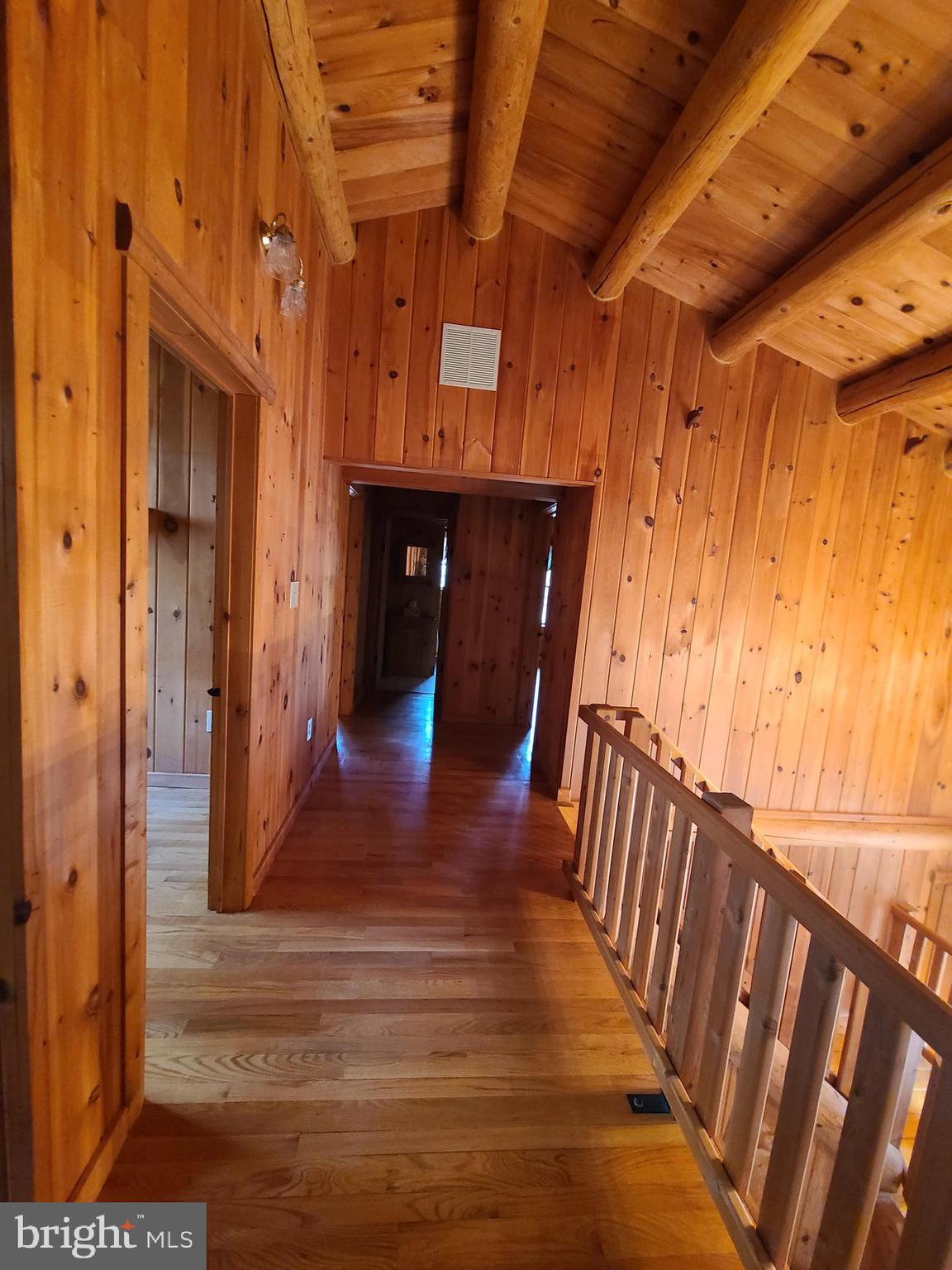 1537 Hidden Valley Road Franklin, WV 26807 - Photo 44 of 78 a view of a hallway with wooden floor