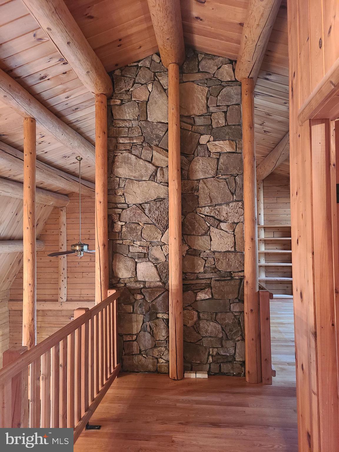 1537 Hidden Valley Road Franklin, WV 26807 - Photo 45 of 78 a view of a porch with wooden floor and a door