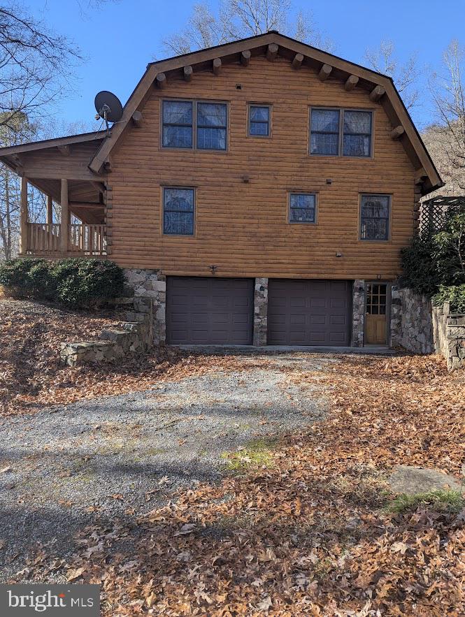1537 Hidden Valley Road Franklin, WV 26807 - Photo 9 of 78 a front view of a house with a yard