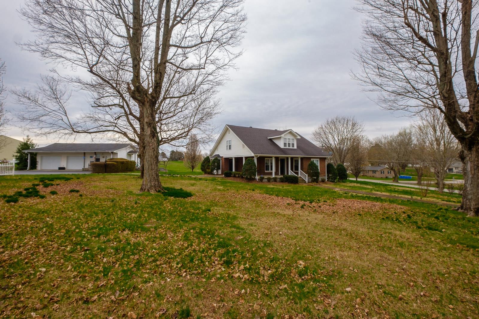 900 Red Boiling Springs Road Lafayette, TN 37083 - Photo 2 of 30 a view of a house with a yard
