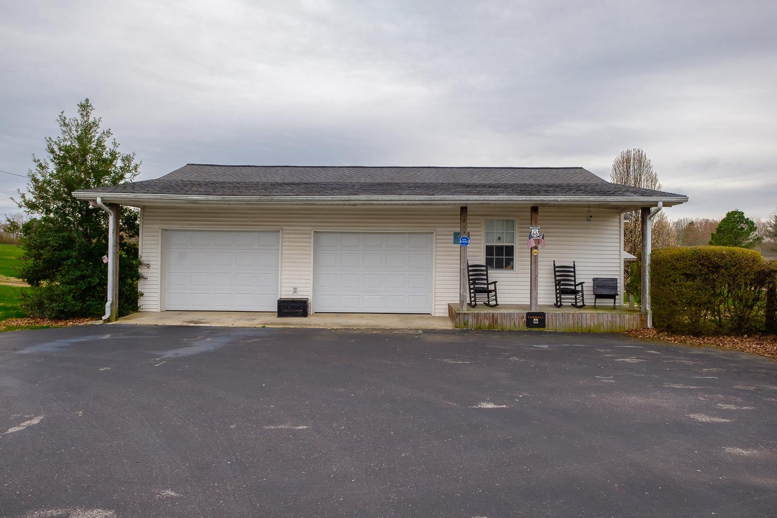 900 Red Boiling Springs Road Lafayette, TN 37083 - Photo 6 of 30 a view of a house with outdoor space and parking