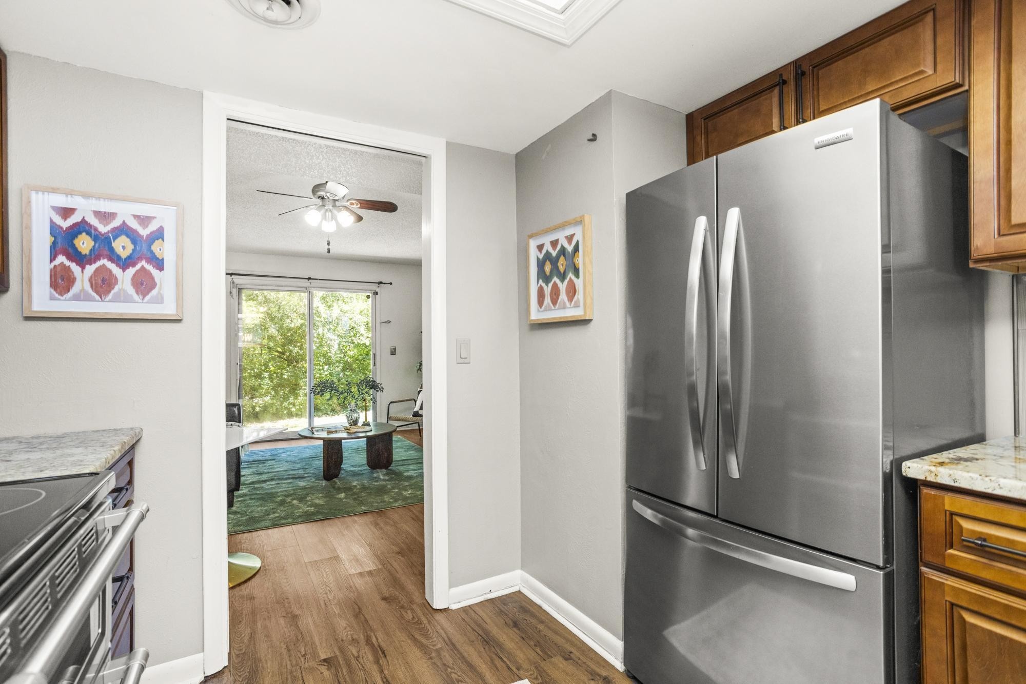 21 Vaughns Gap Road, Unit 16 Nashville, TN 37205 - Photo 11 of 34 a kitchen with stainless steel appliances a refrigerator and a stove