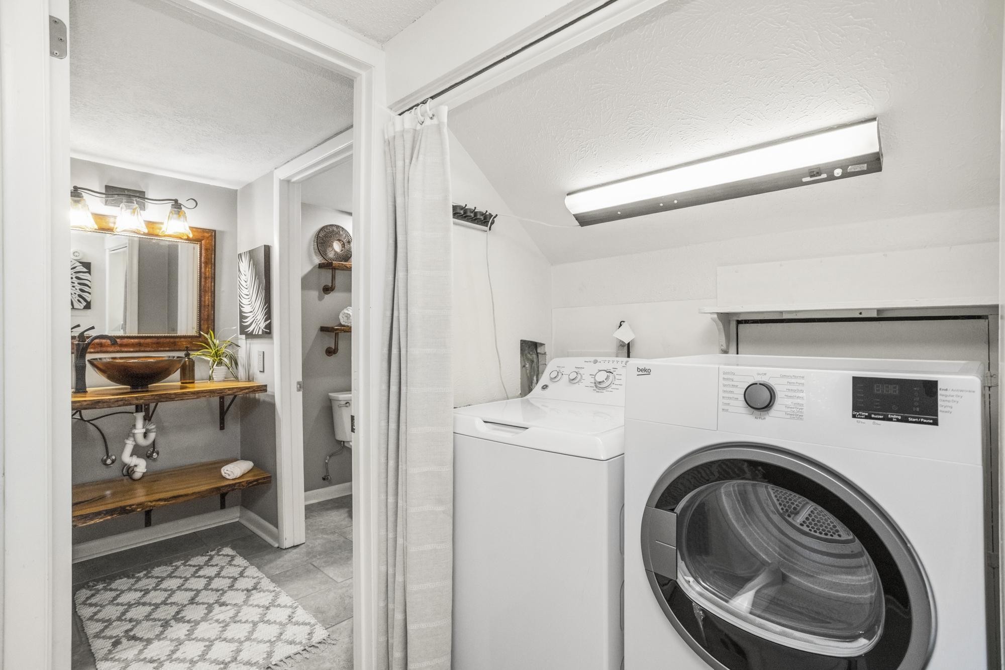 21 Vaughns Gap Road, Unit 16 Nashville, TN 37205 - Photo 13 of 34 a utility room with closet dryer and washer
