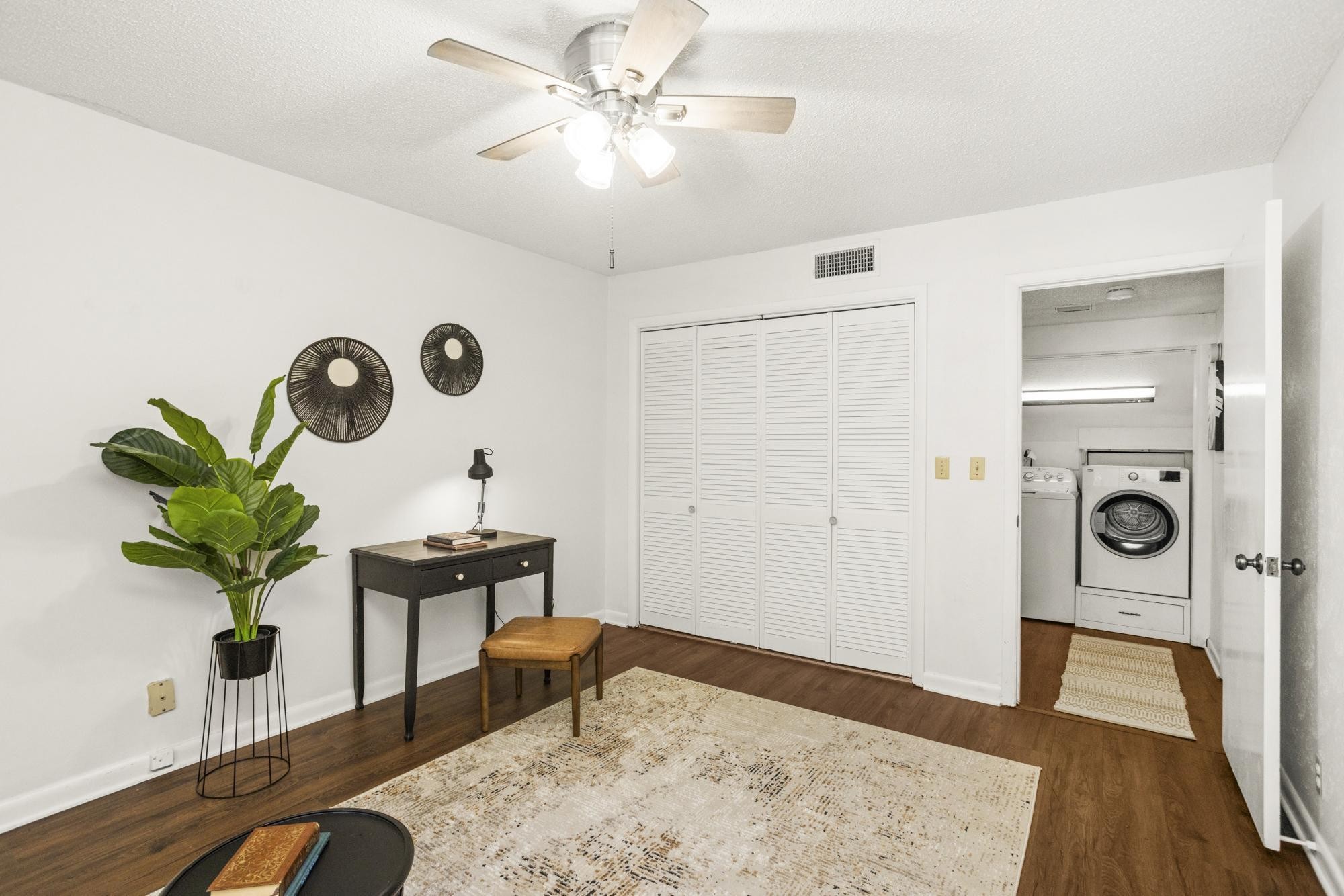 21 Vaughns Gap Road, Unit 16 Nashville, TN 37205 - Photo 16 of 34 a workspace with furniture and wooden floor