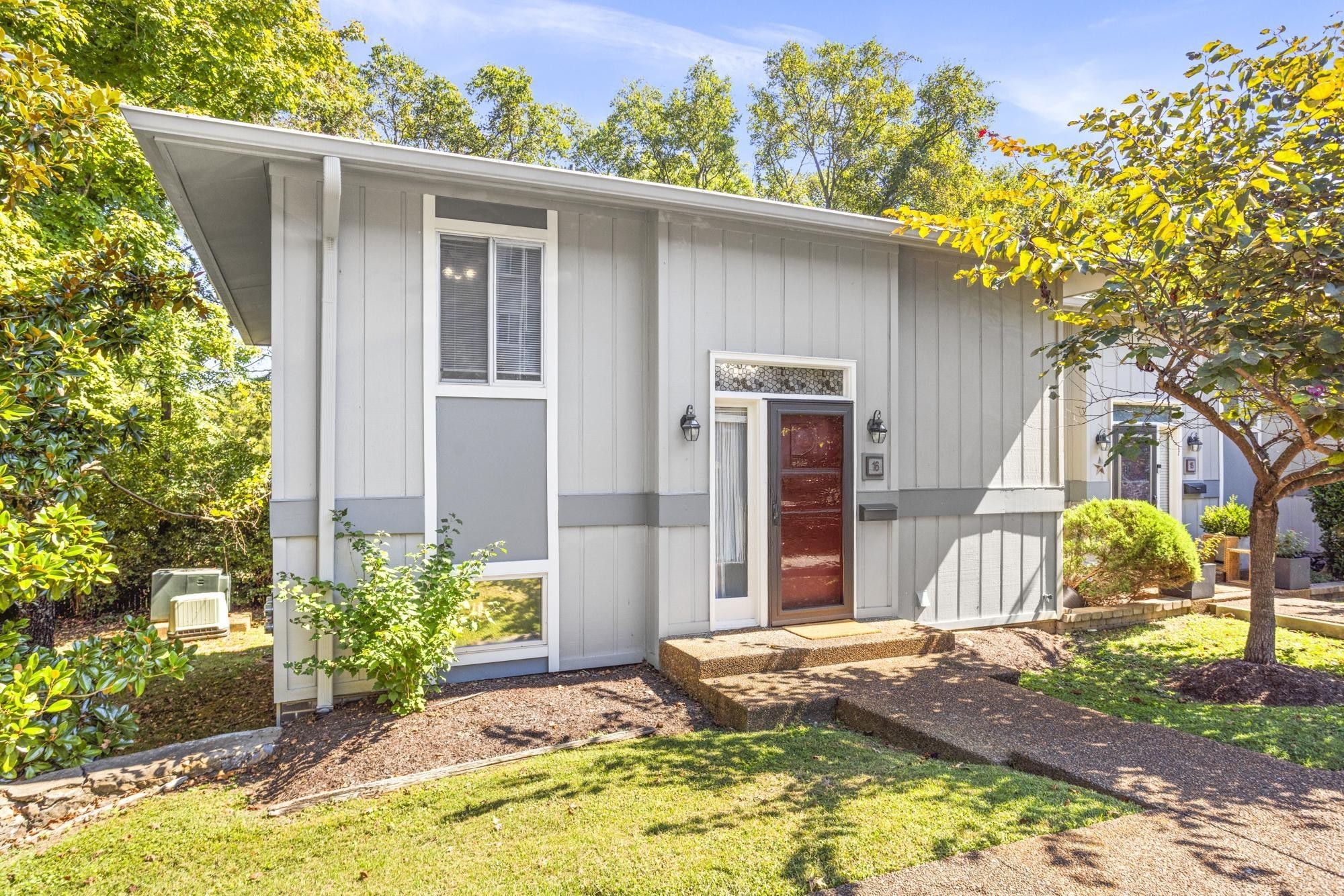 21 Vaughns Gap Road, Unit 16 Nashville, TN 37205 - Photo 2 of 34 a front view of house with yard