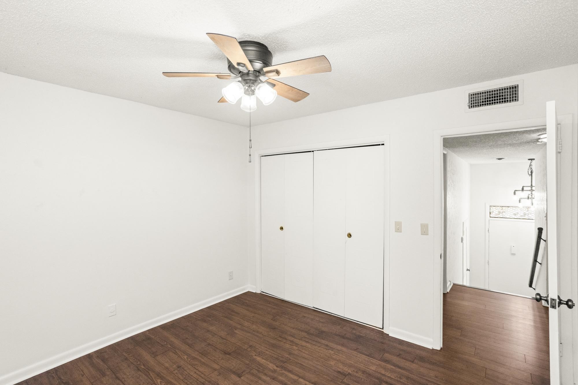 21 Vaughns Gap Road, Unit 16 Nashville, TN 37205 - Photo 26 of 34 a view of a room with wooden floor