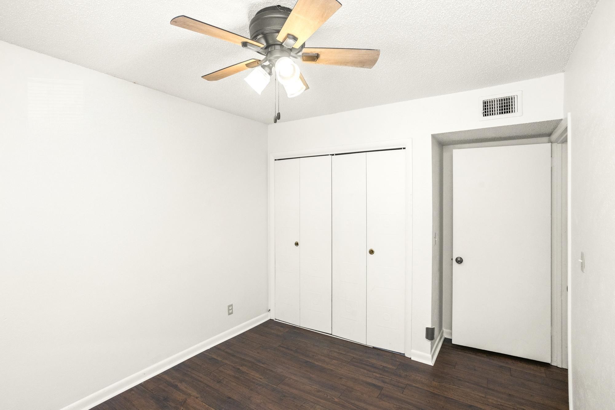 21 Vaughns Gap Road, Unit 16 Nashville, TN 37205 - Photo 29 of 34 wooden floor in an empty room