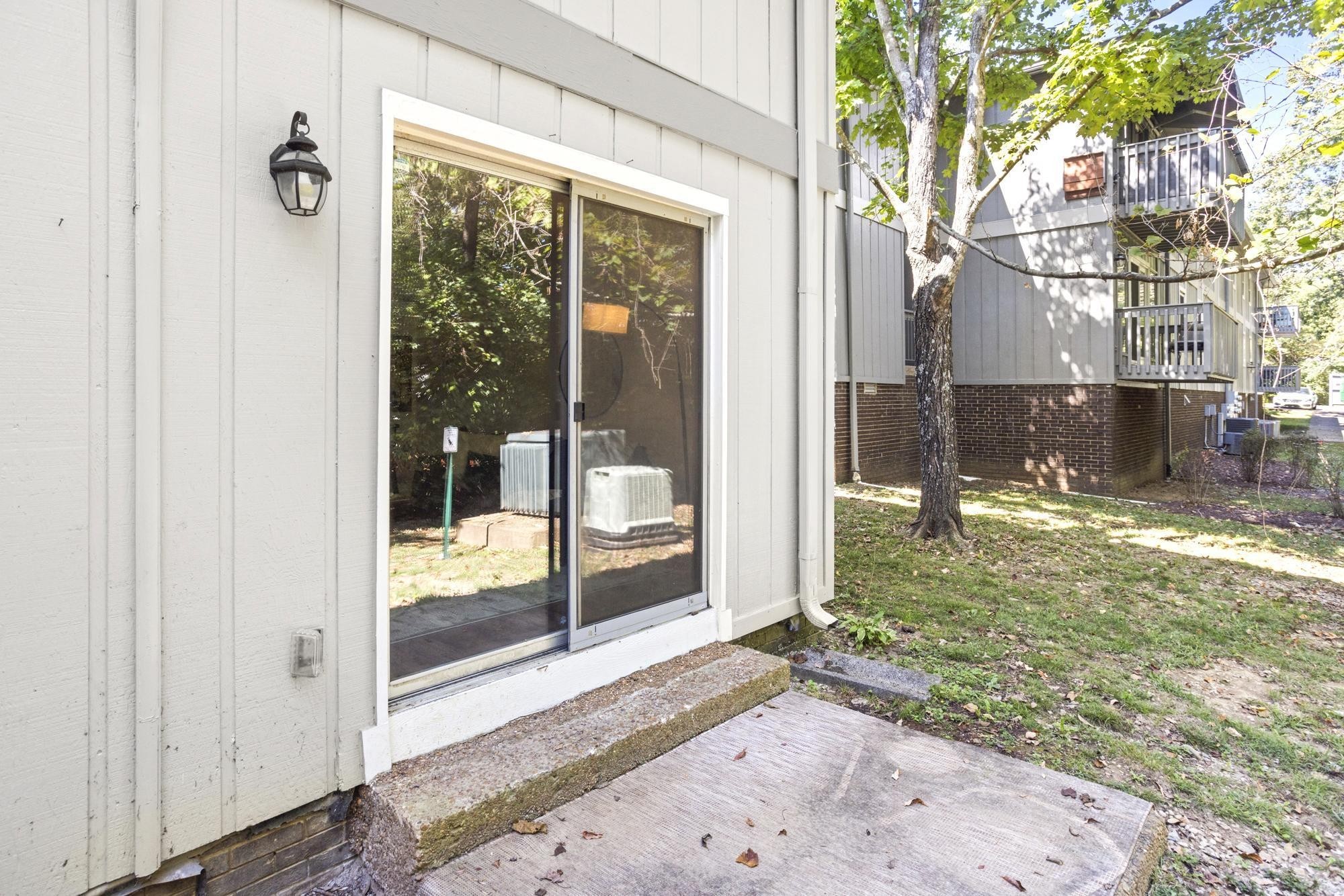 21 Vaughns Gap Road, Unit 16 Nashville, TN 37205 - Photo 31 of 34 a view of a backyard of a house