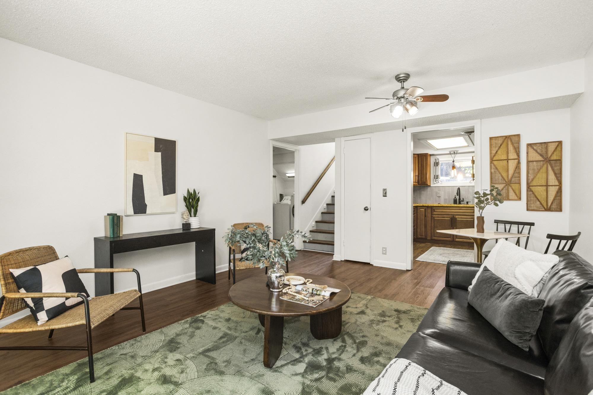 21 Vaughns Gap Road, Unit 16 Nashville, TN 37205 - Photo 8 of 34 a living room with furniture and wooden floor