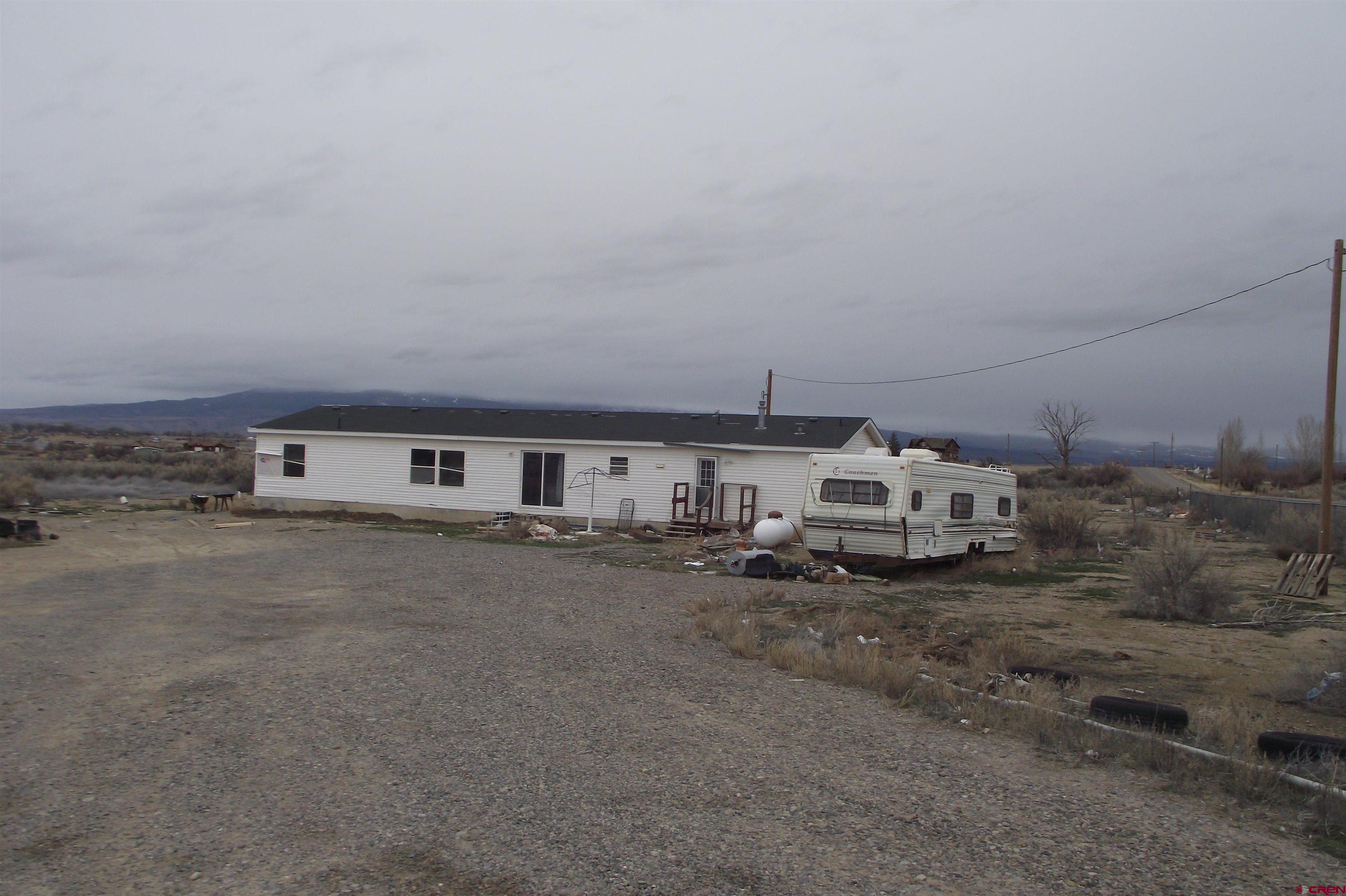a big room with table and chairs