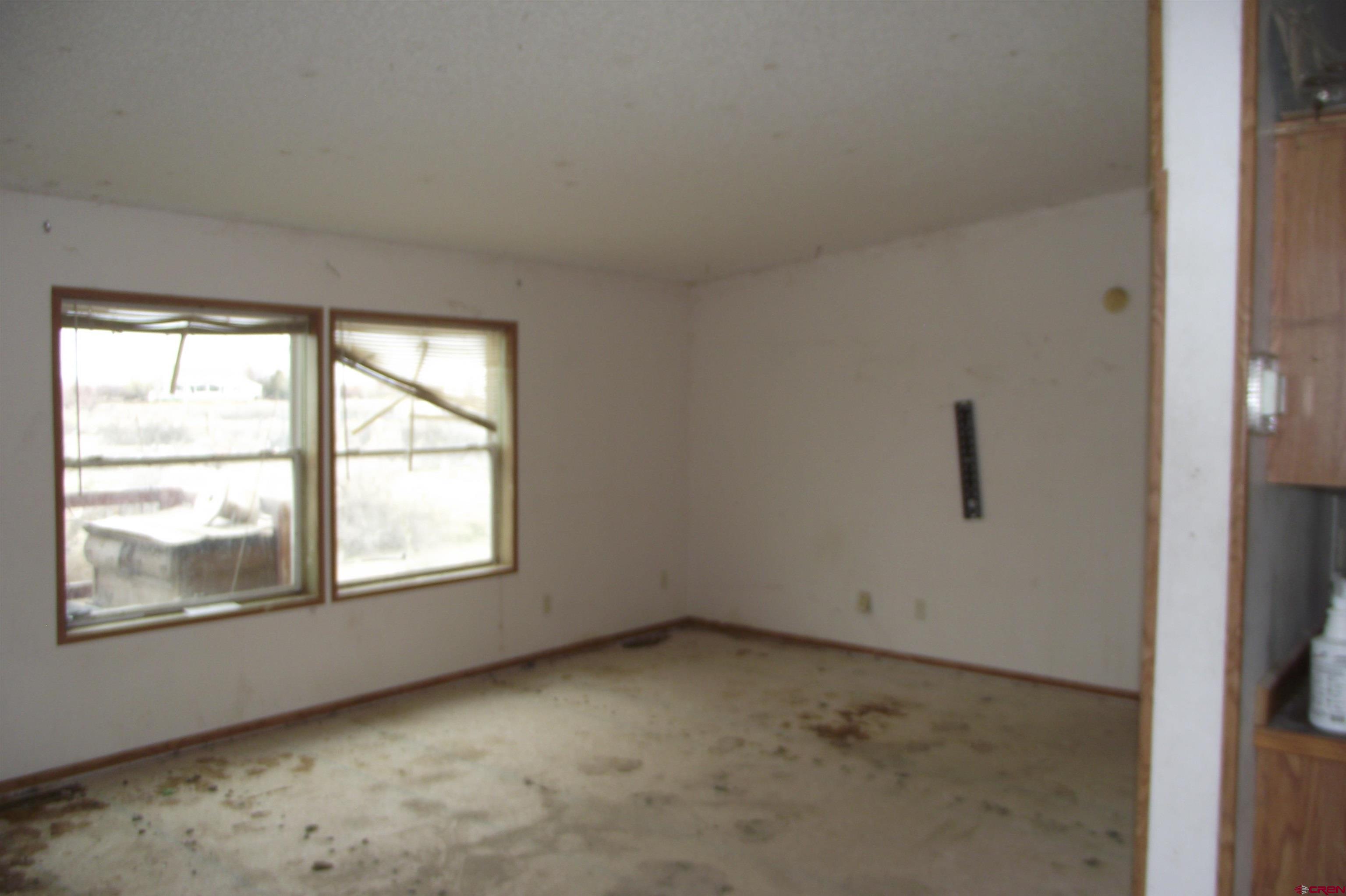 3747 2000th Road Delta, CO 81416 - Photo 13 of 24 an empty room with a window