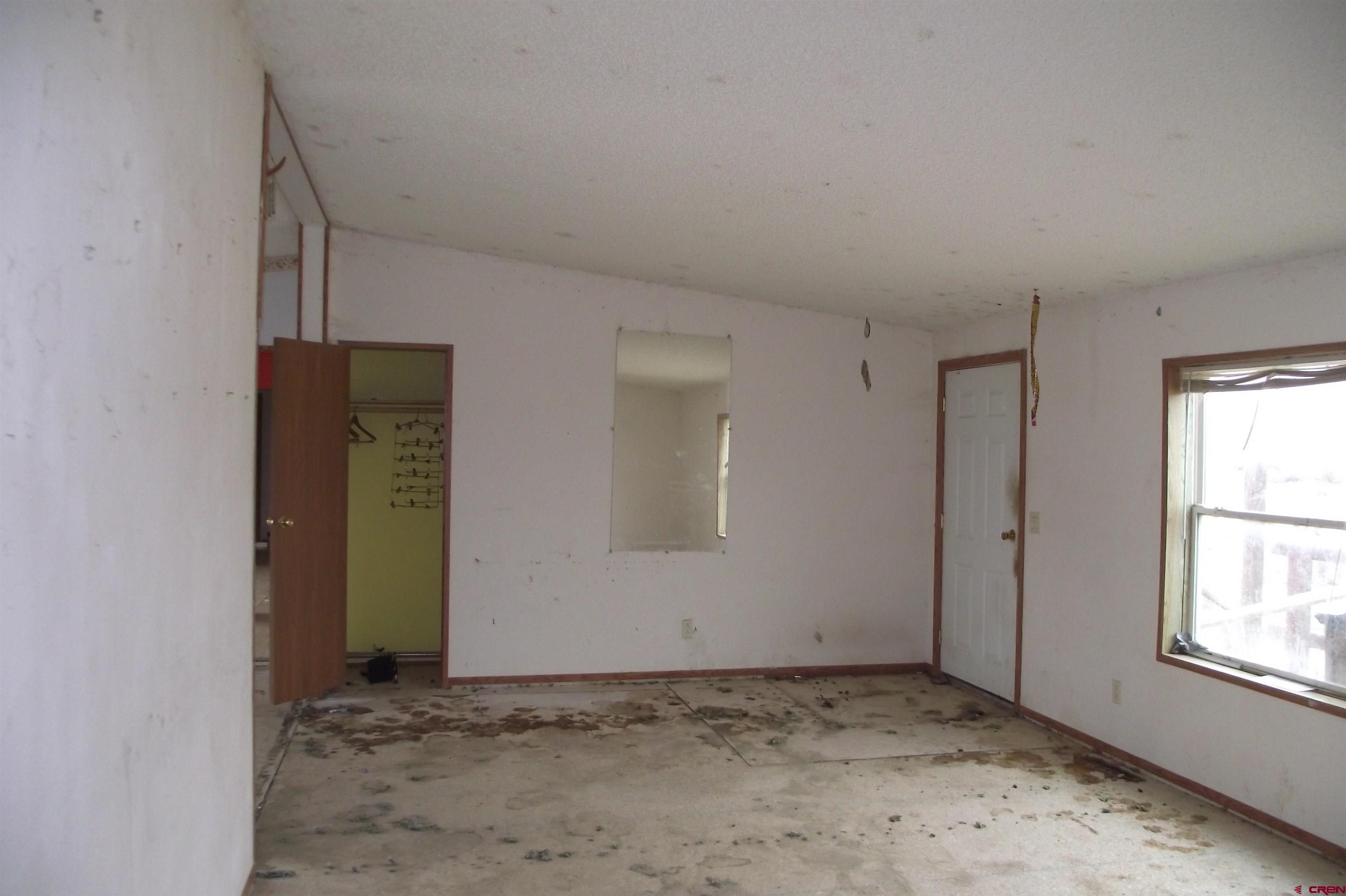 3747 2000th Road Delta, CO 81416 - Photo 16 of 24 an empty room with windows