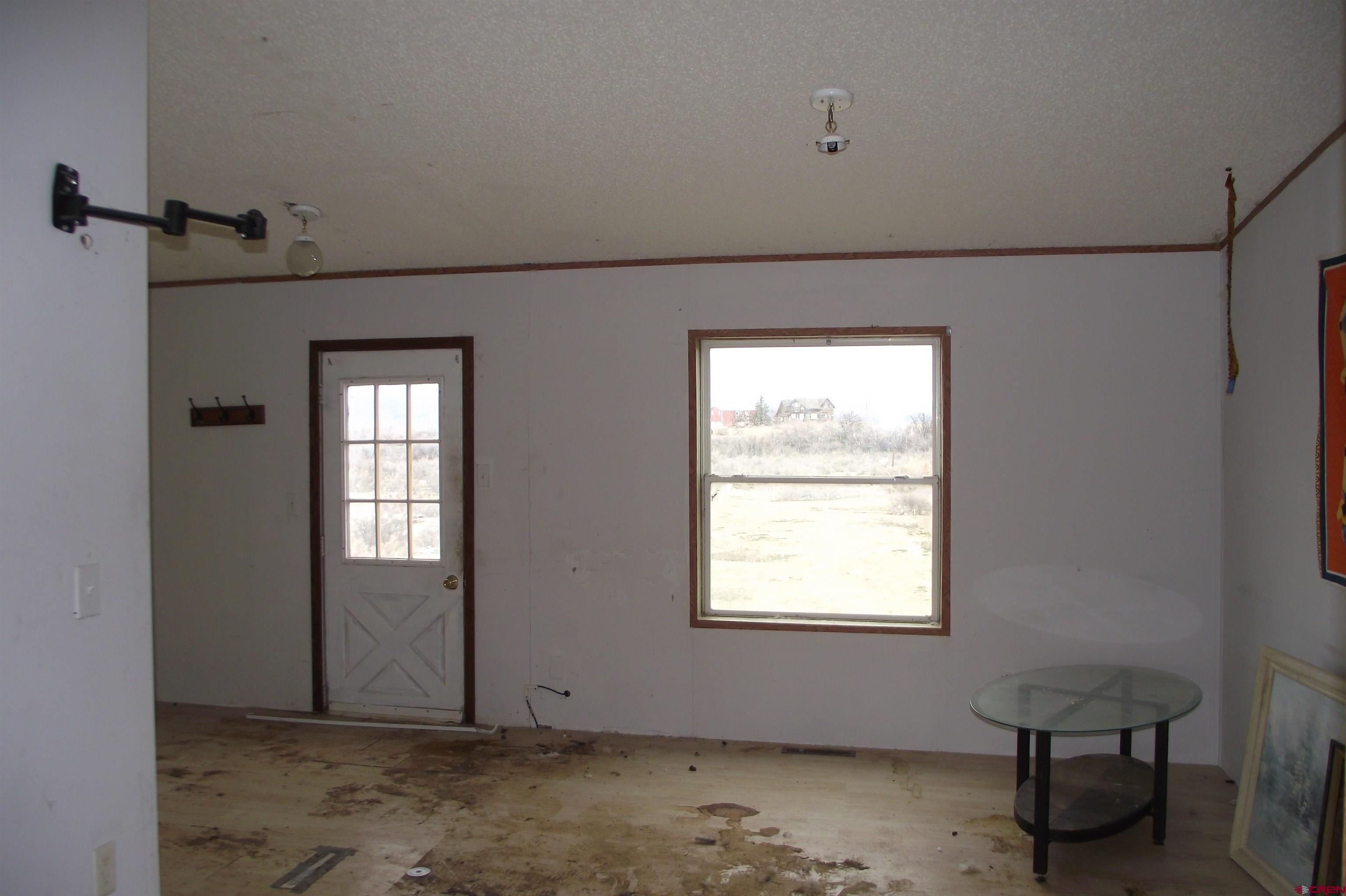 3747 2000th Road Delta, CO 81416 - Photo 23 of 24 a view of an empty room with a window