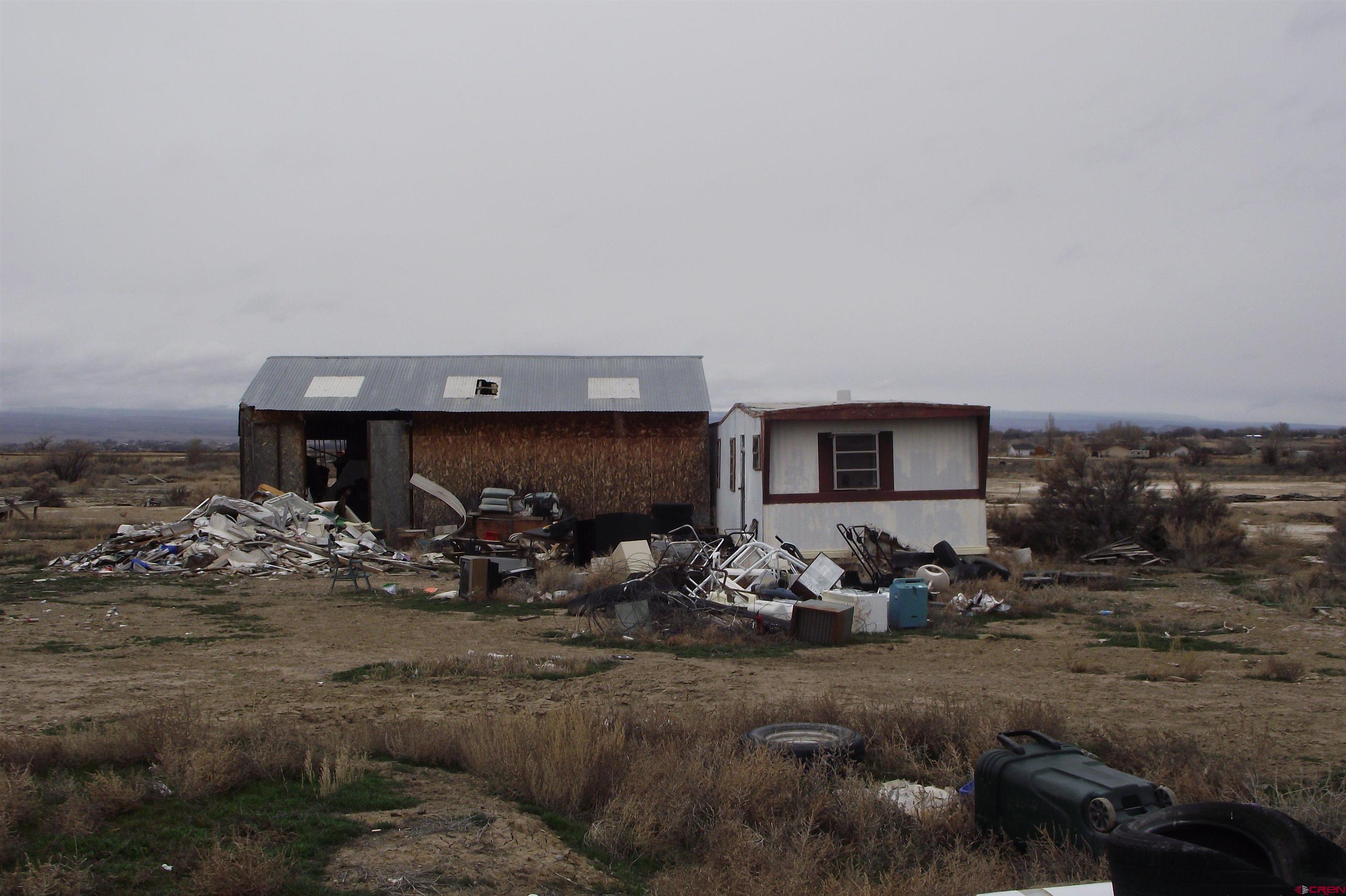 3747 2000th Road Delta, CO 81416 - Photo 5 of 24 a view of a livingroom with furniture