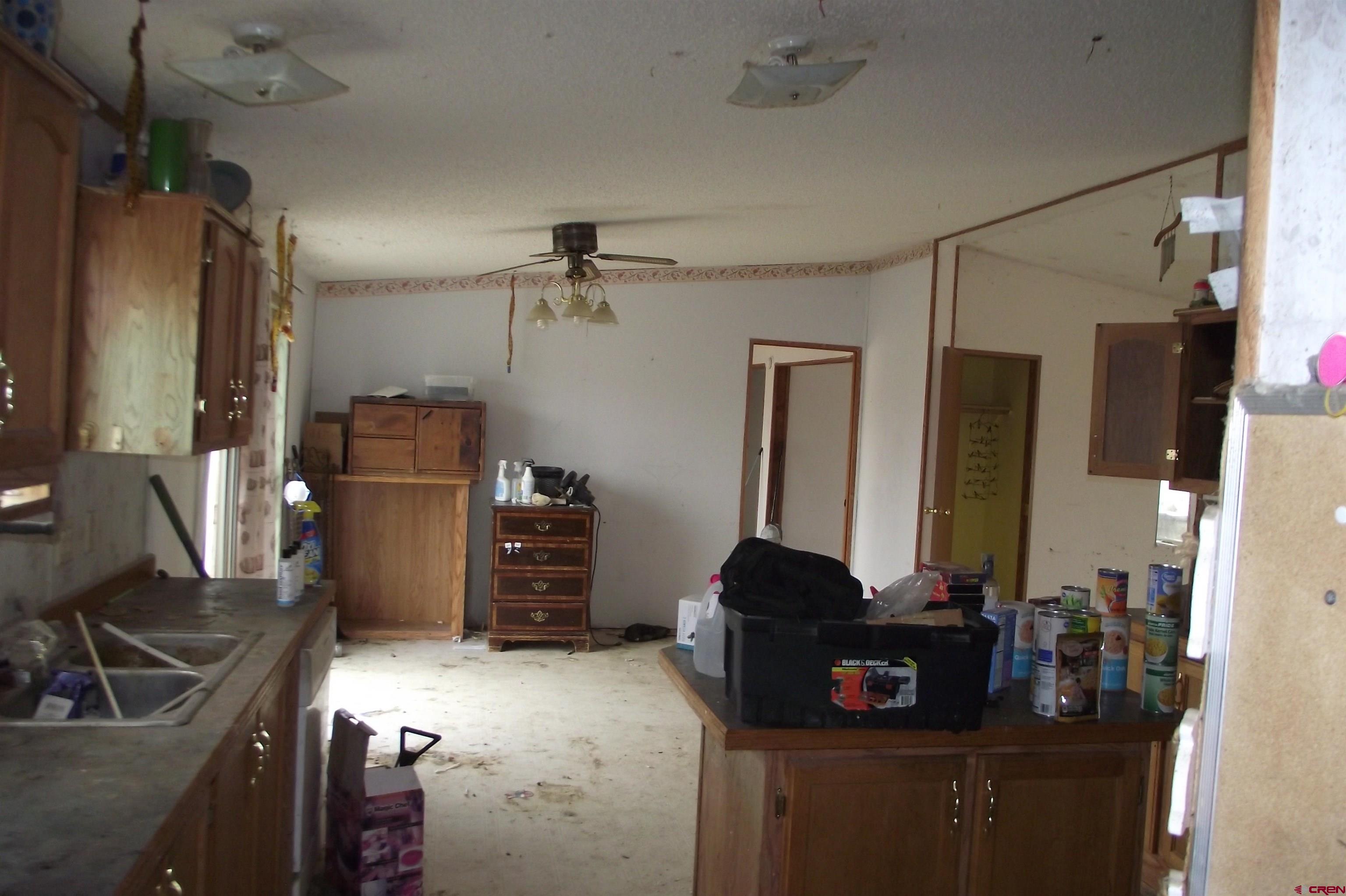 3747 2000th Road Delta, CO 81416 - Photo 10 of 24 a bathroom with a sink vanity and a mirror