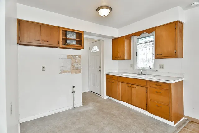 a bathroom with a sink a mirror and a bathtub
