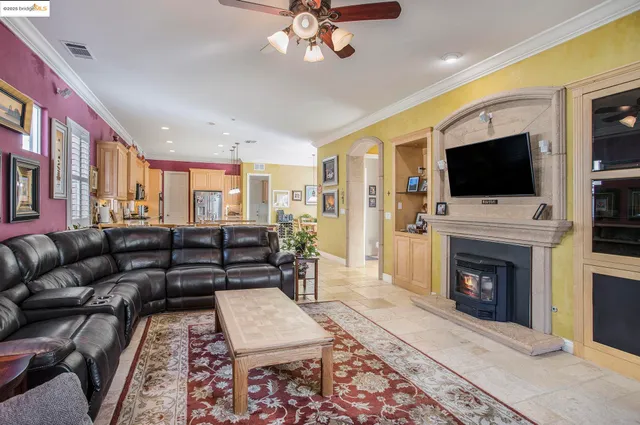 a kitchen with stainless steel appliances granite countertop a sink and cabinets