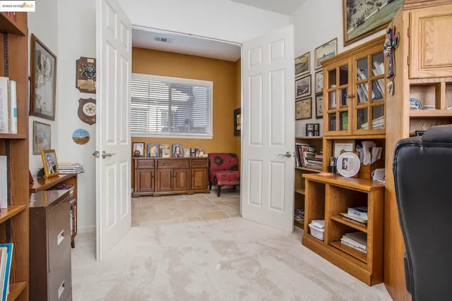 a view of an entryway with furniture and front door