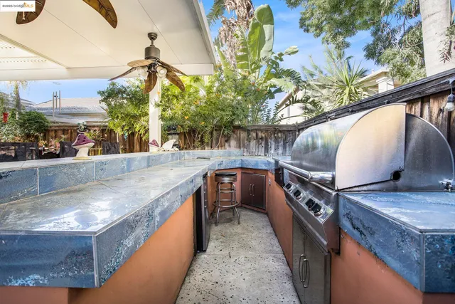 a view of a backyard and a tub