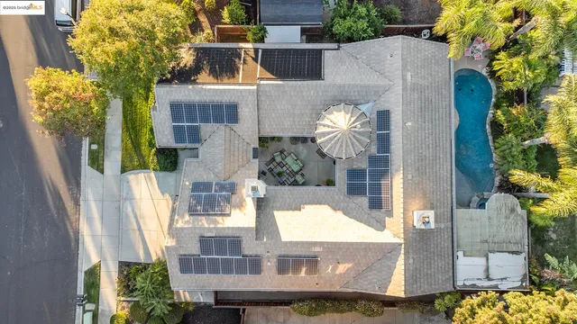 front view of a house with a fountain