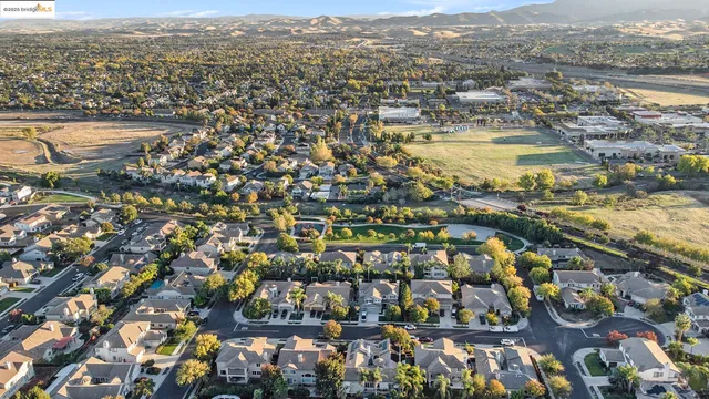 an aerial view of residential building and lake view