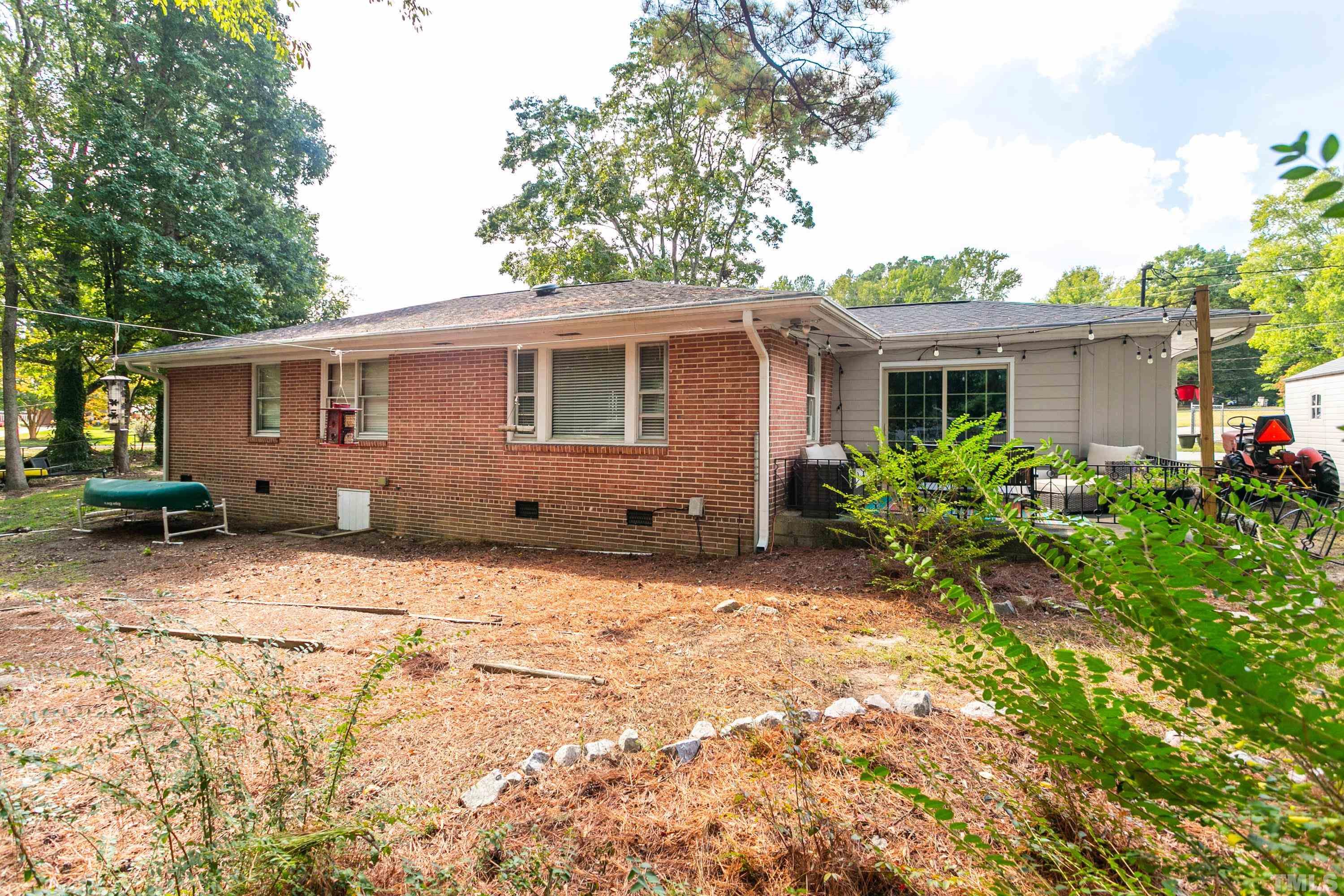 3702 Randell Road Garner, NC 27529 - Photo 22 of 24 a backyard of a house with seating space