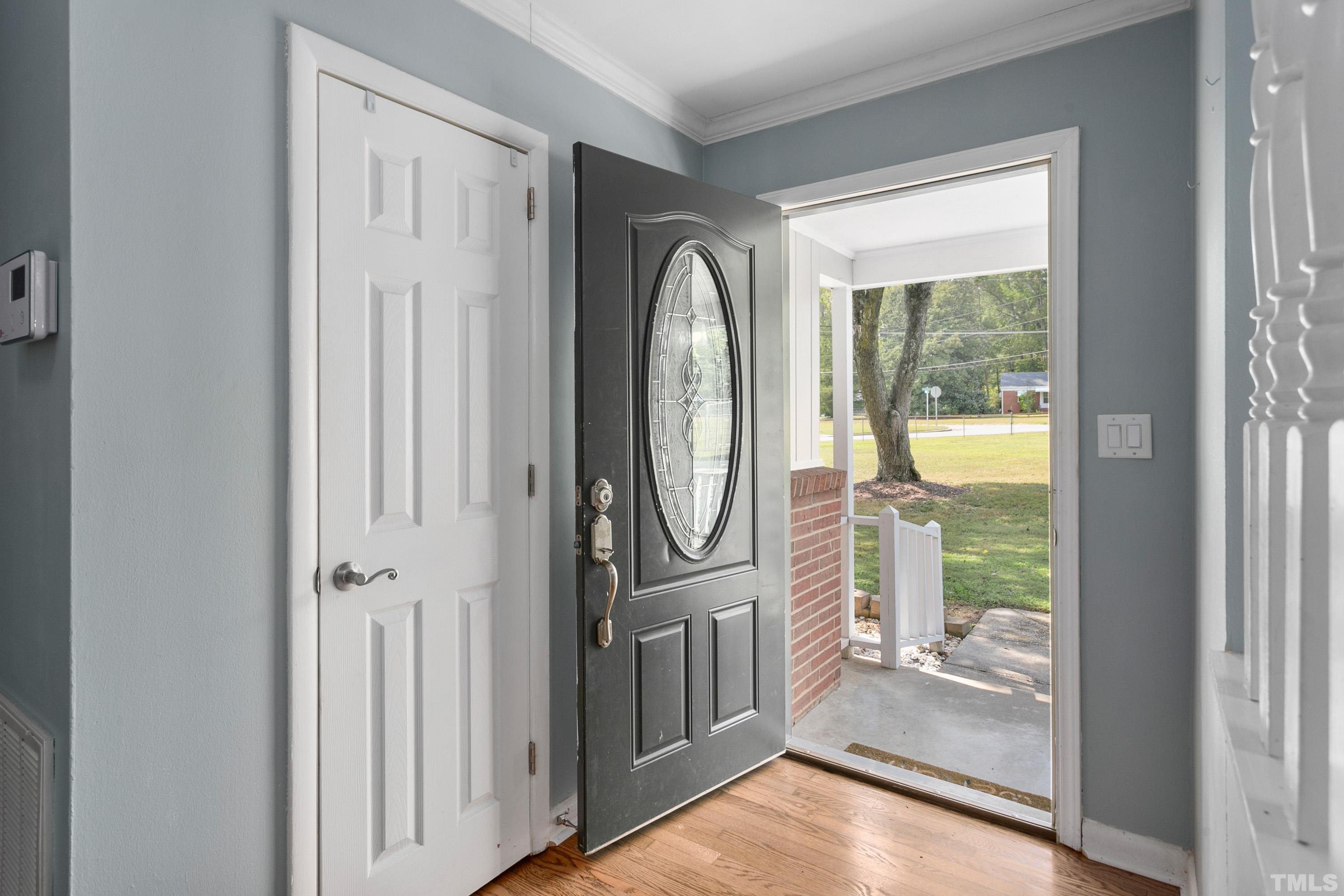 3702 Randell Road Garner, NC 27529 - Photo 5 of 24 a view of a hallway with windows