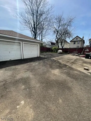 a view of a house with a snow in the yard