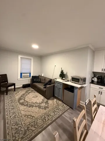 a bedroom with a bed and a desk in it