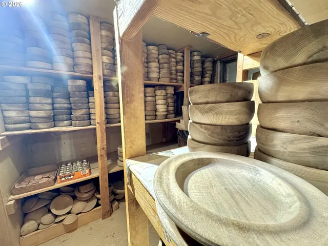 a bathroom with a mirror and a shower